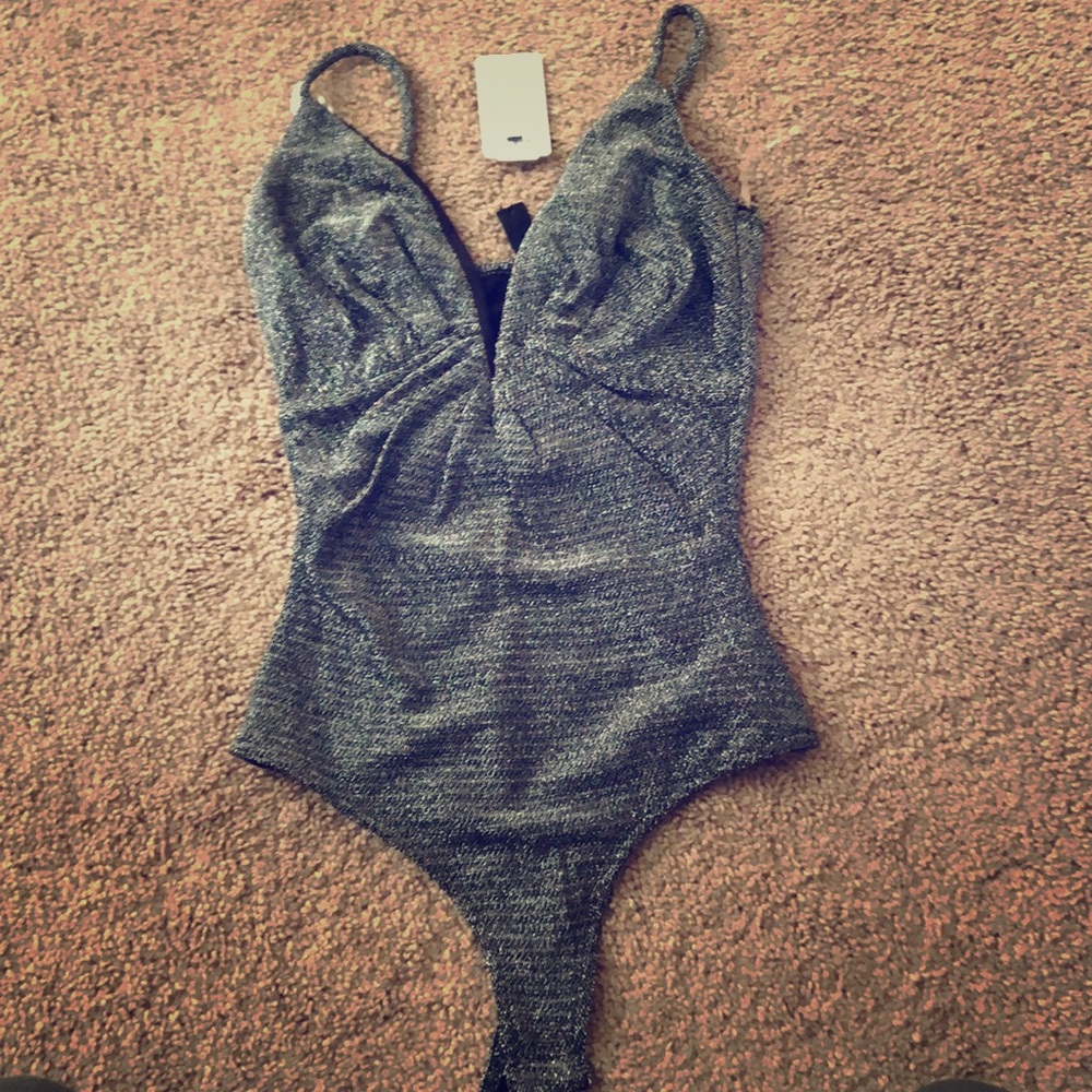 Body suit with bra wire